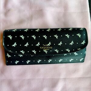COACH wallet, black with white butterflies, blue interior